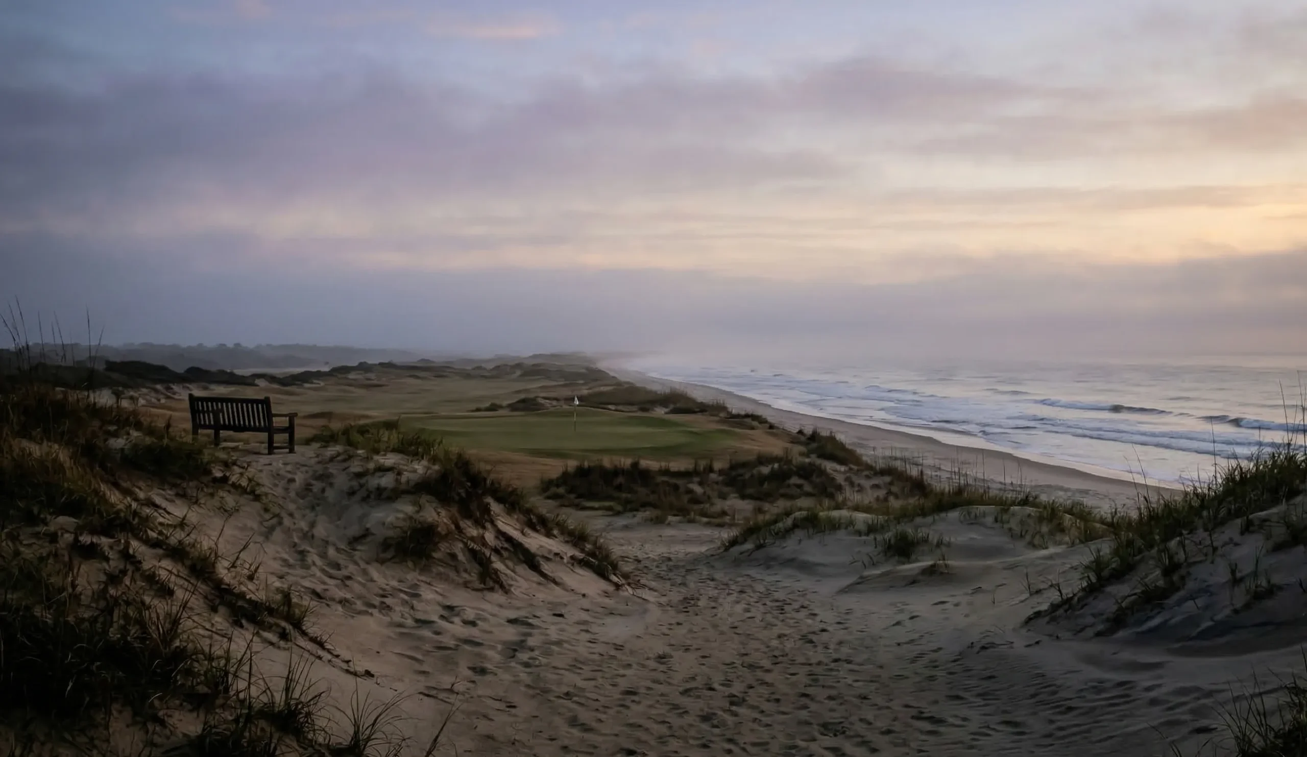 A peaceful coastline at dawn showing the landscape used for the business of presence retreats